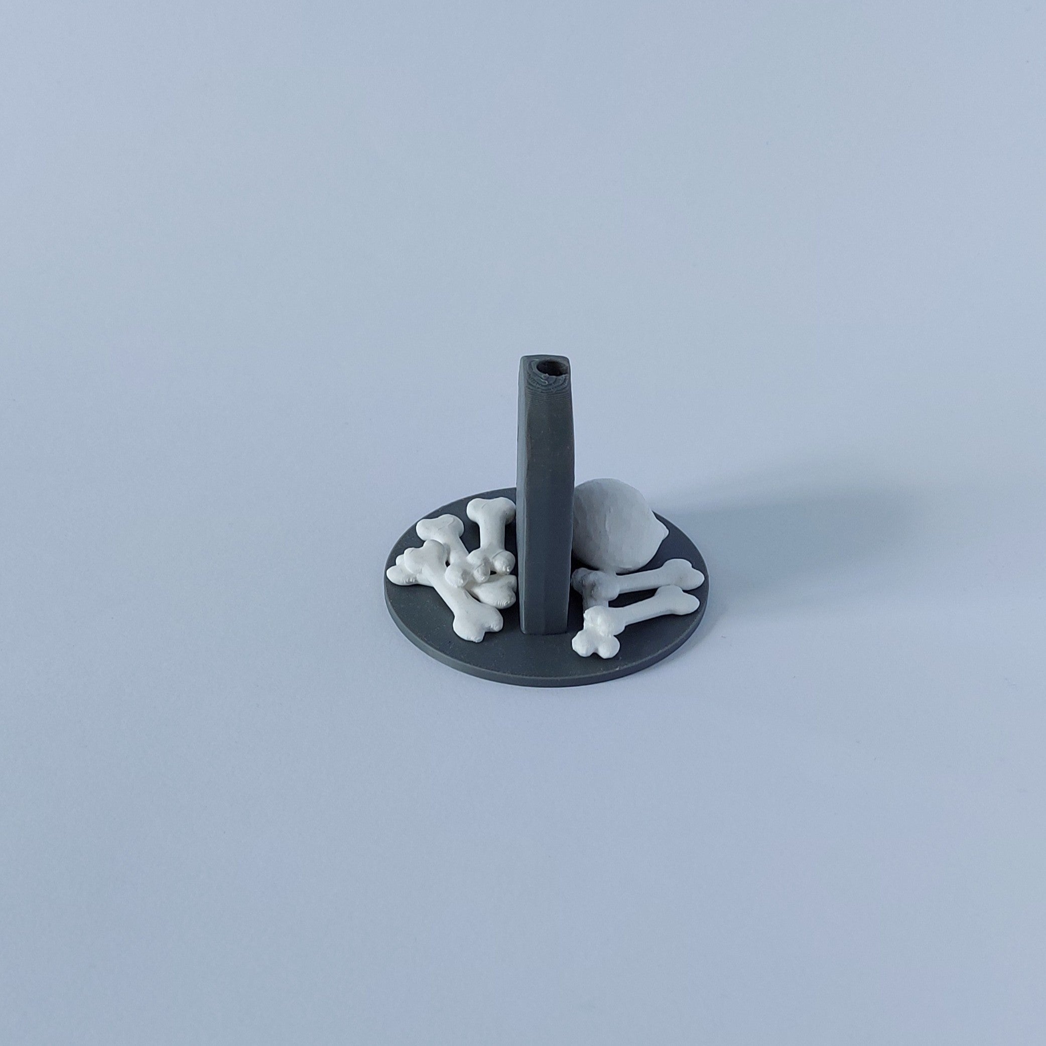 Tombstone & skull spray holder