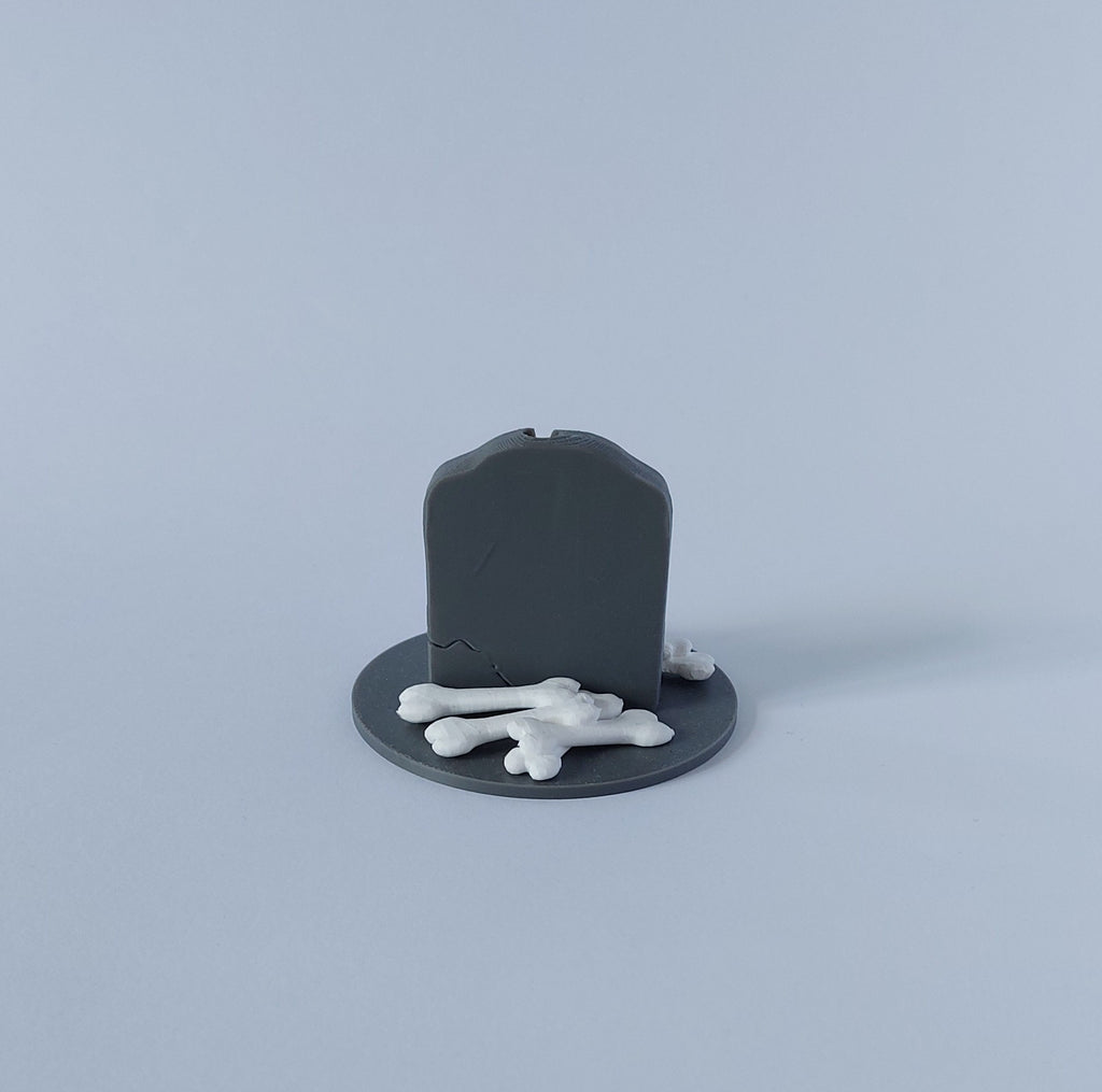 Tombstone & skull spray holder