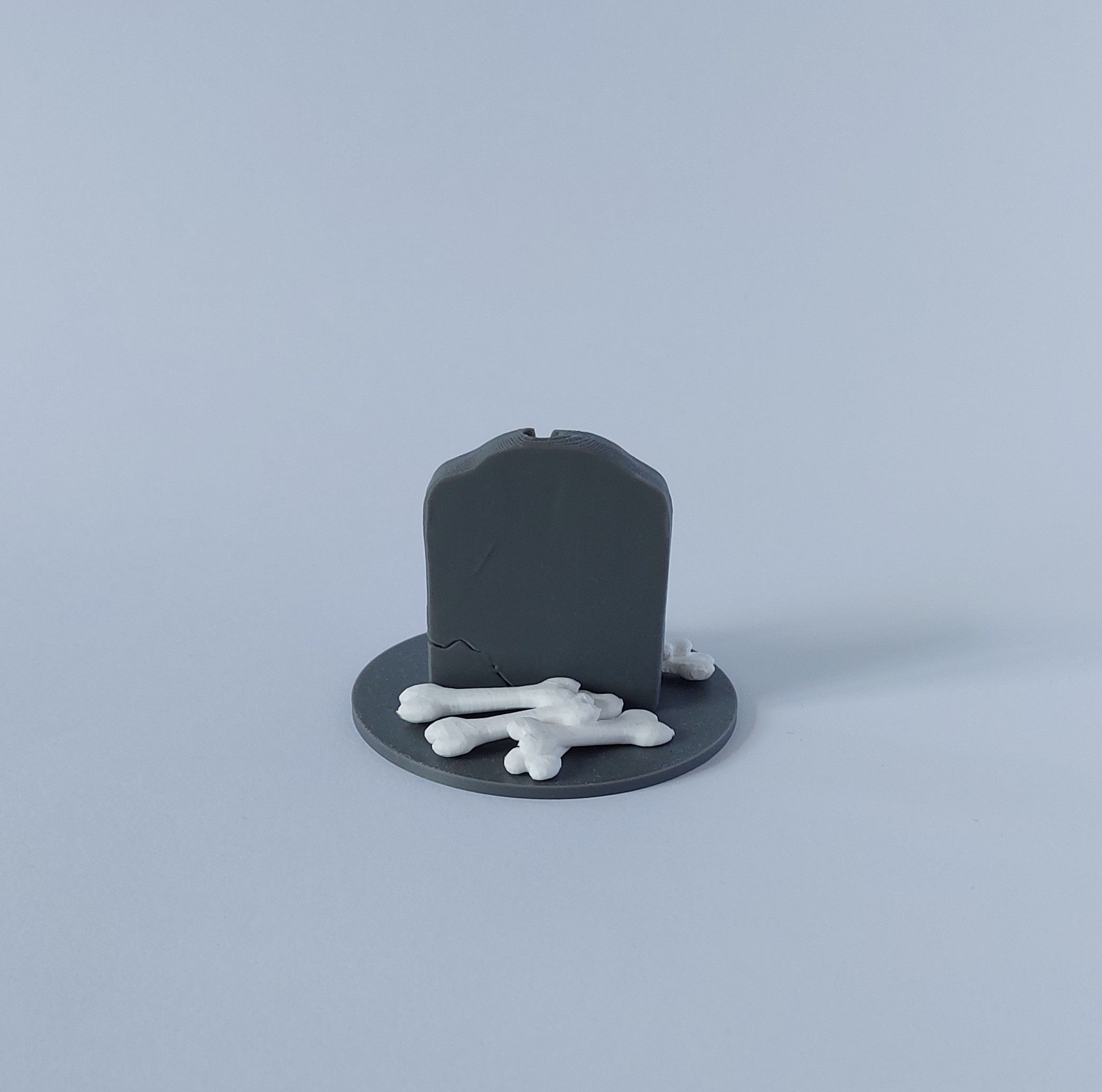 Tombstone & skull spray holder
