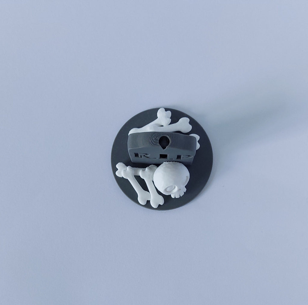 Tombstone & skull spray holder