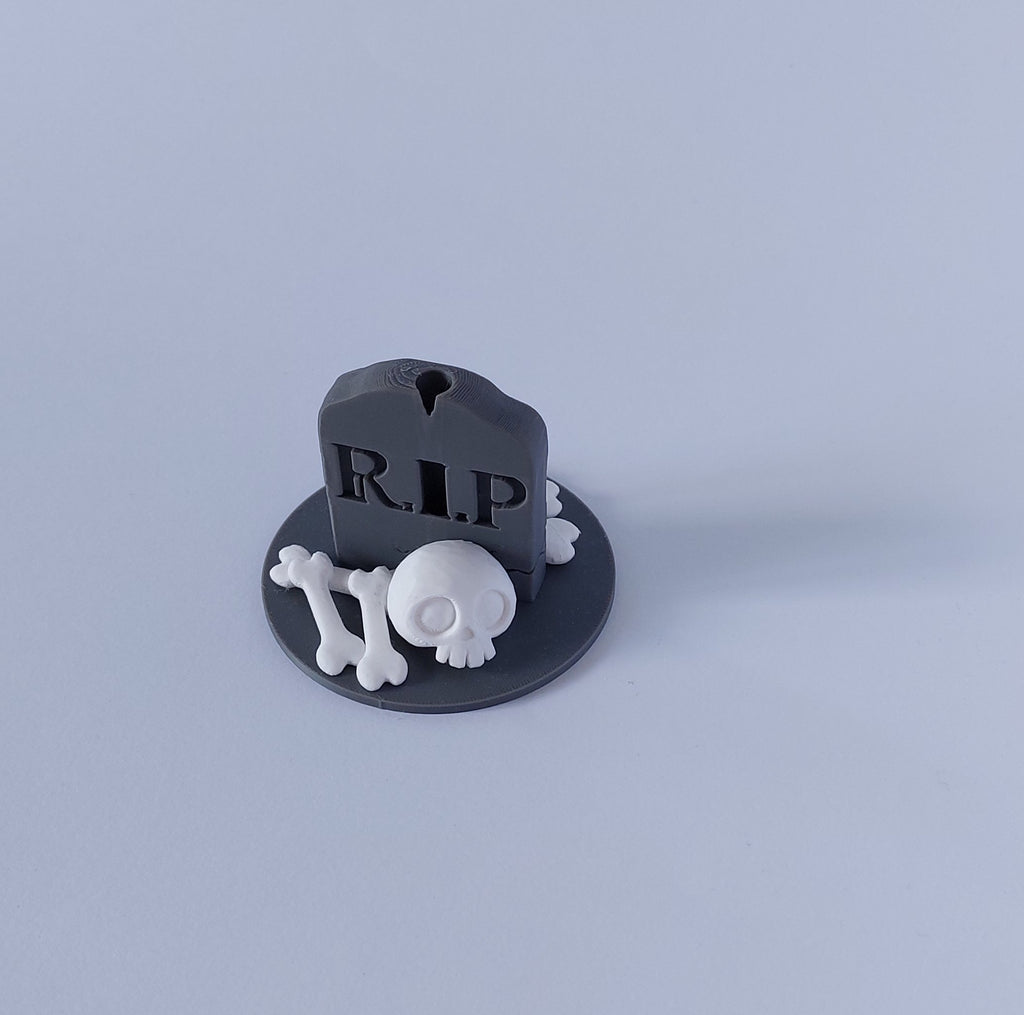 Tombstone & skull spray holder