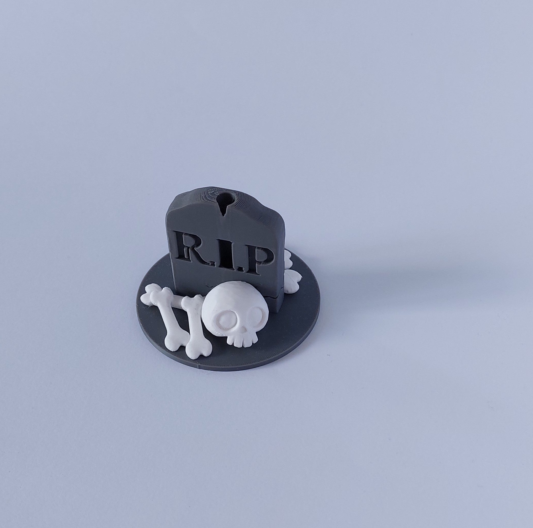 Tombstone & skull spray holder